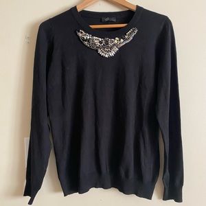 Black knit sweater with beaded front